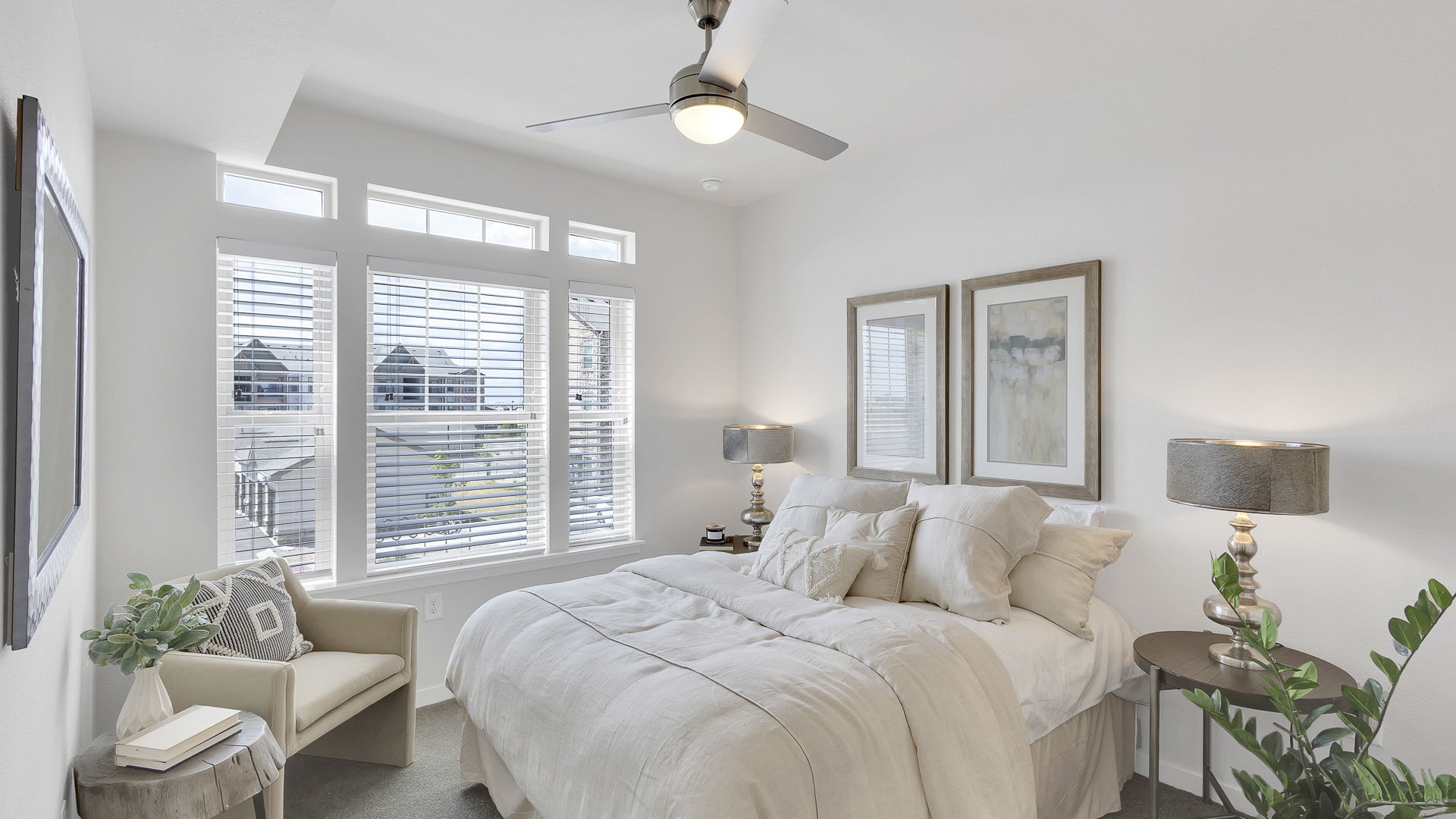 Primary bedroom with ceiling fan